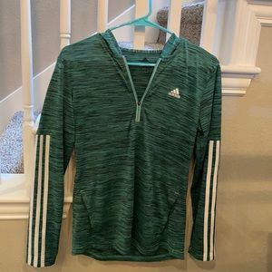 Lightweight adidas 1/4 zip women’s top with hood and front pocket. Green print